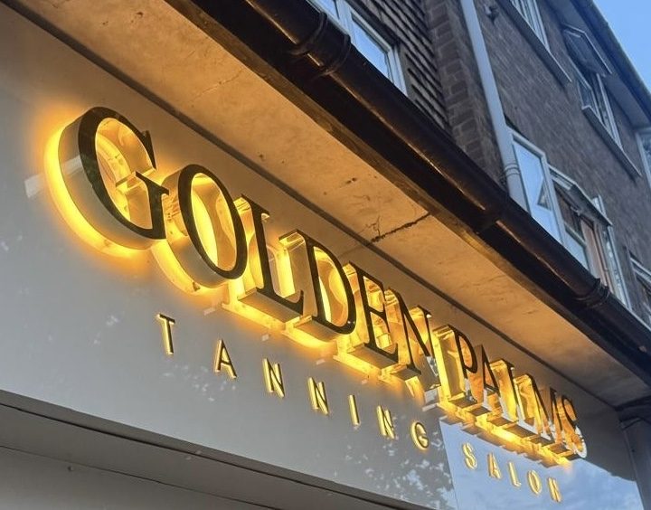 Golden Palms Tanning Salon illuminated fascia sign